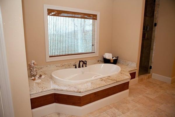 A tub surround fabricated and installed by Stonetrends.