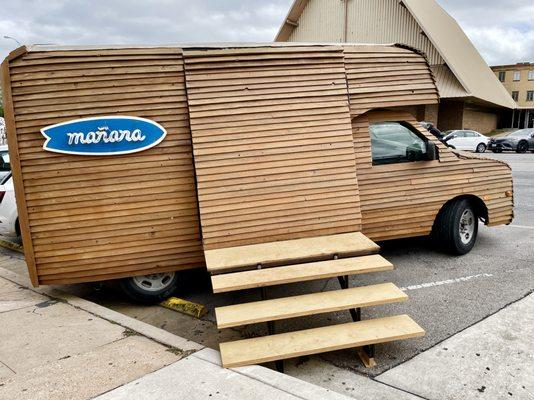 Can't miss the all-wood paneled Mañana van parked on SoCo.