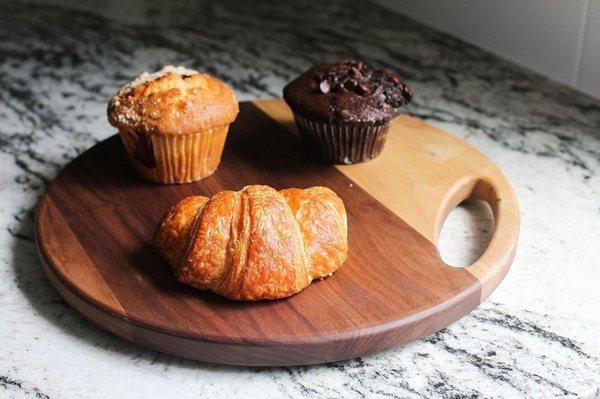 Croissant, double chocolate muffin, and blueberry muffin