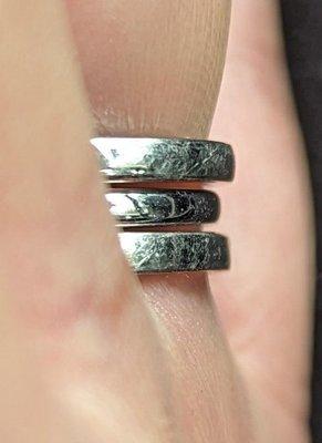 Diamond ring doesn't sit flush with the 2 bands because BN thinned it out instead of adding white gold to keep a consistent width.