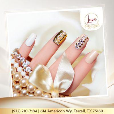 Indulge in the opulence of luxury gold nails.