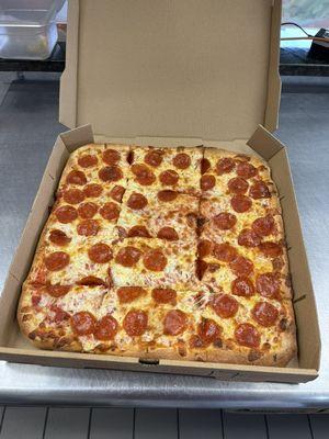 16" sicilian pizza $12.40 (extra cost for toppings)