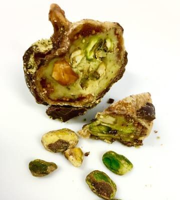 Pistachio Ganache filled Turkish figs dipped in dark chocolate... Pure decadence