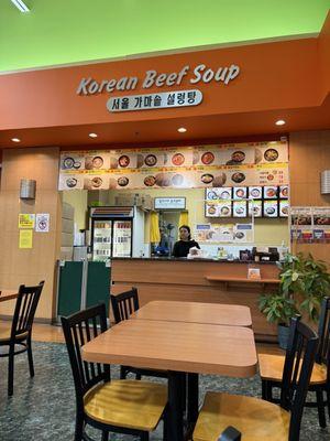 That is the owner of this korean beef soup restaurant