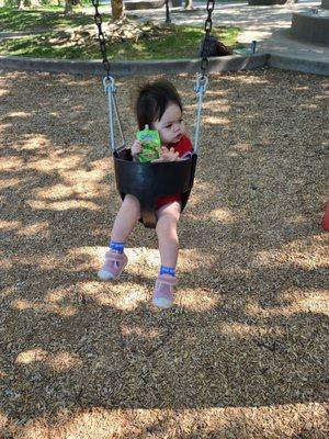 Our baby enjoying the swing