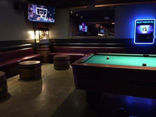 Comfy seats, pool table, sporty TV, and music box.