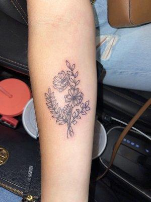 Flower tattoo done by Eric. Amazing line work & was exactly what I wanted  was very happy!