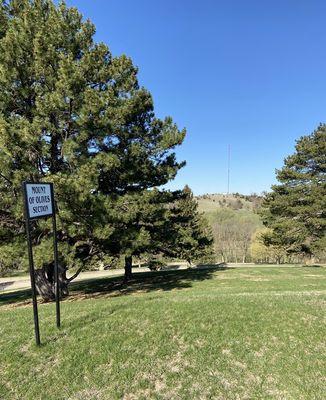 Sign marking a cemetery area burial ground location name.