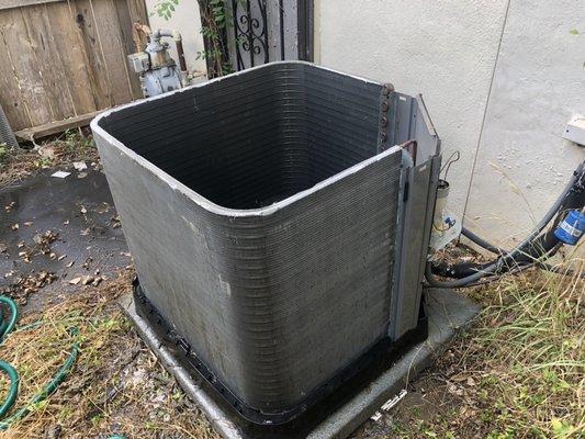 Cleaned condenser coil. Removed grills and fan to clean from inside out.