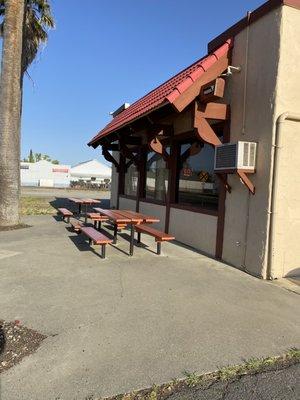 Picnic tables outside.