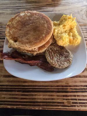 Chefs Breakfast: 3 pancakes, 3 pieces of bacon, 1 sausage patty, & eggs.