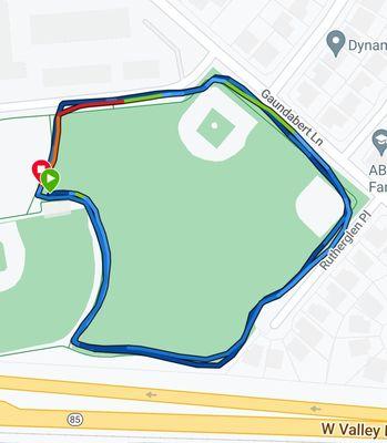 It is a great alternative (flat/paved) path to run when the track is closed. 1/2 mile per lap.