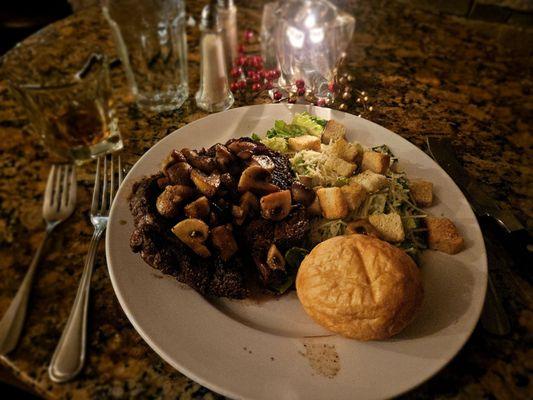 16 oz ribeye with sautéed mushrooms and Ceasars salad