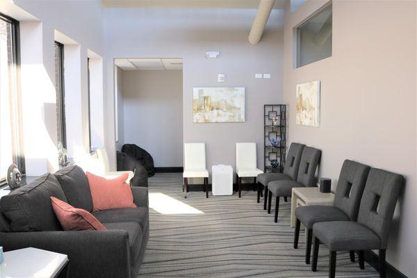 Reception area, natural lighting and entry into the children's room.