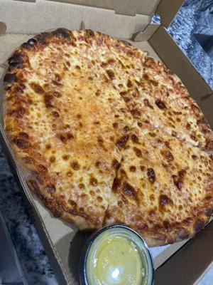 Cheese pizza and side of garlic butter