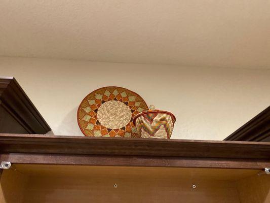 Decorative plate and container with lid from Uganda.