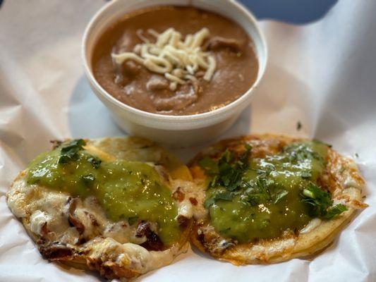 Al pastor gringas with mild sauce and side of refried beans