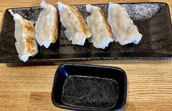 Gyoza was nicely grilled with a sauce on the side.