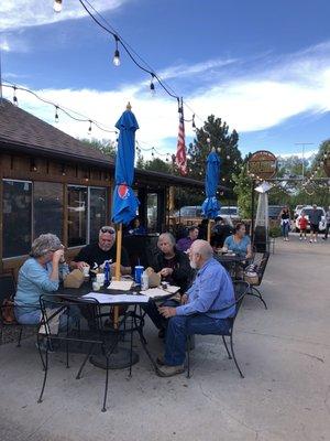 Outdoor seating. The brown building is the House restaurant, next door to Red Barn Creamery