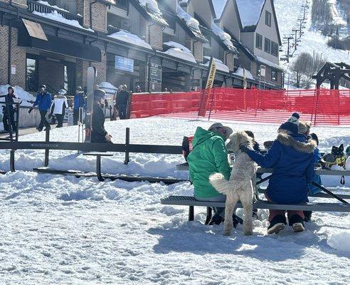 Open picnic/drink deck just outside Aloha ski/board rental shop at Park City base area.