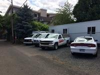 UHaul vehicles are located in the alley east of Mississippi Ave