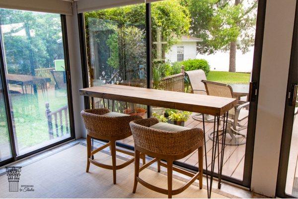 A Florida sunroom living has a unique approach to coastal decor.