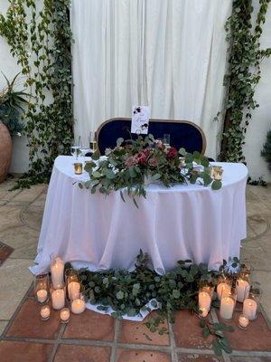 I LOVE the Loveseat for the sweethearts table!