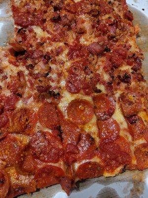 Half bacon pizza.