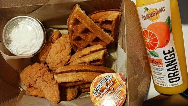 In-Room Dining breakfast: chicken and waffles and orange juice