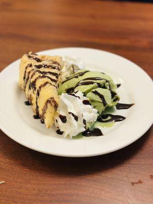 Cheesecake tempura with green tea ice cream and chocolate drizzle