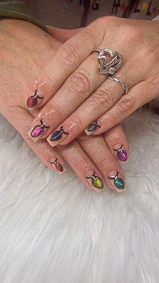 Acrylic nails with art by Kristina