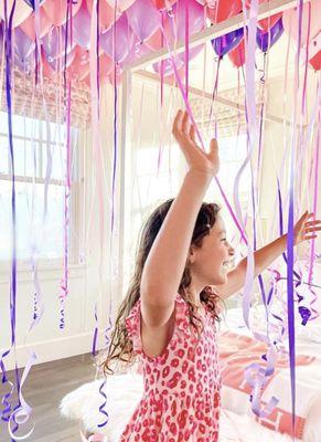 The best wake up call 
 A SEA of balloons for the birthday girl!