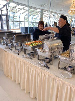 No one was wearing gloves. A spoon fell on the floor they were going to put it back on the table until one of our guest told them not to