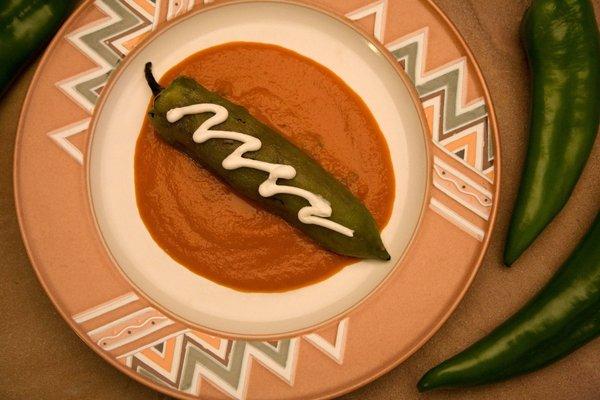 Stuffed New Mexico green chile served with an organic tomato sauce.