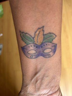 This is my tattoo a few days later after Flex added a darker purple and yellow.