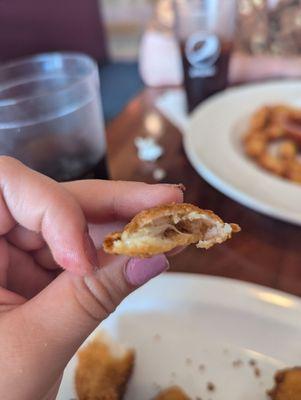 Thin chicken with lots of breading.