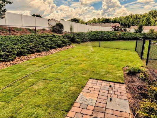 sod installation and dry creek bed.