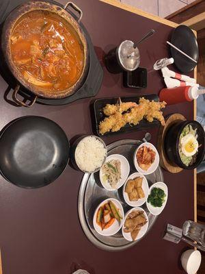 Kimchi Jigae and Hot Stone Bibimbap with Dumpling and shrimp tempura.