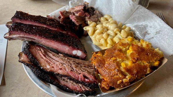 Platter with Brisket, Ribs, Pulled Pork, Smoke Mac N Cheese and Cornbread Casserole.