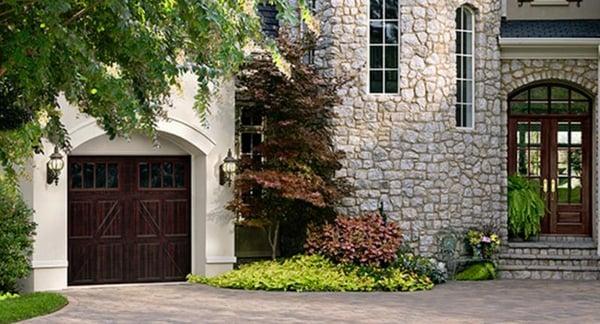 Wood Color Garage Doors that are really steel.  Are very popular now.