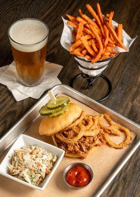 BBQ Pulled Pork Sandwich with coleslaw and sweet potato fries