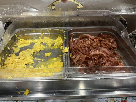 The free breakfast- watery eggs and undercooked bacon.