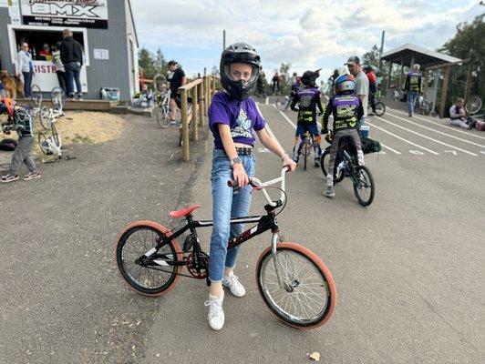 Ellie riding a Dan Loudermilk original bike for sale ($250)