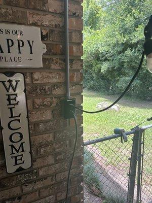 Added (1) duplex outlet with conduit under carport area.