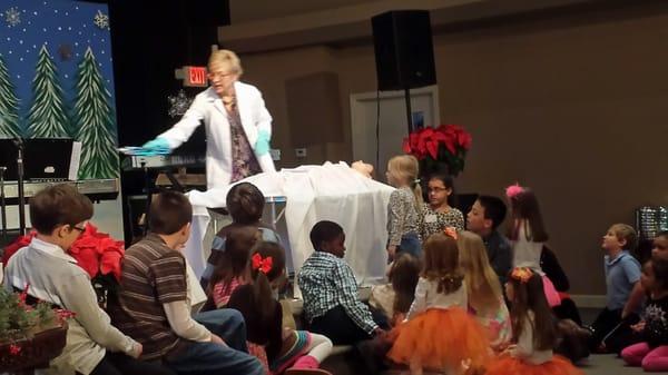 Pastor Tammy does a wonderful job engaging the children.