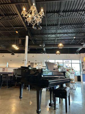 Dining room with Baby Grand piano and lighting.