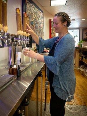 Our amazing manager showing off her Kombucha pouring skills!