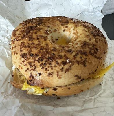 Sausage, egg and cheese on a garlic bagel