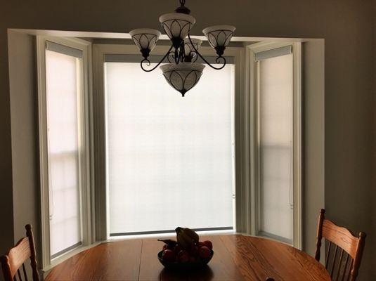 Solar roller shades for heat and glare control. Also, beautiful fabrics.