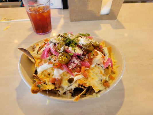 Nachos with added grilled shrimp. Far more than one person can handle!